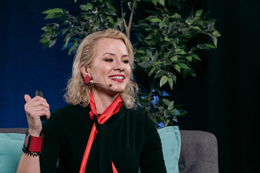 Home Olesija Saue in conversation on stage at a business conference